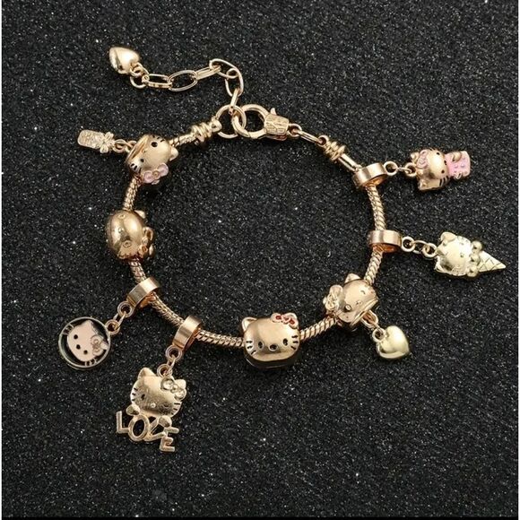 Hello Kitty Gold Plated Charm Bracelet NEW - Picture 1 of 7